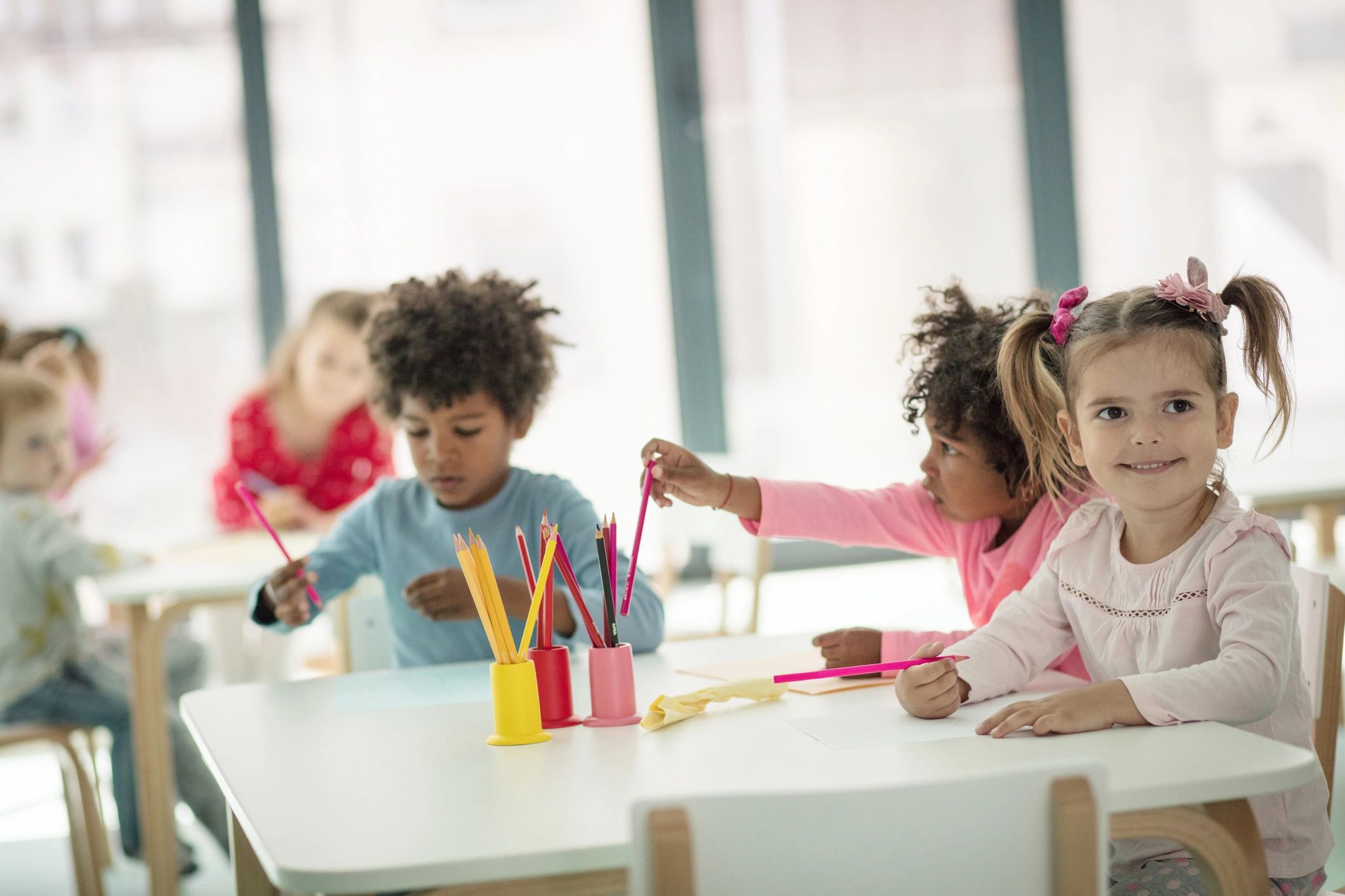 Children creating crafts together at school
