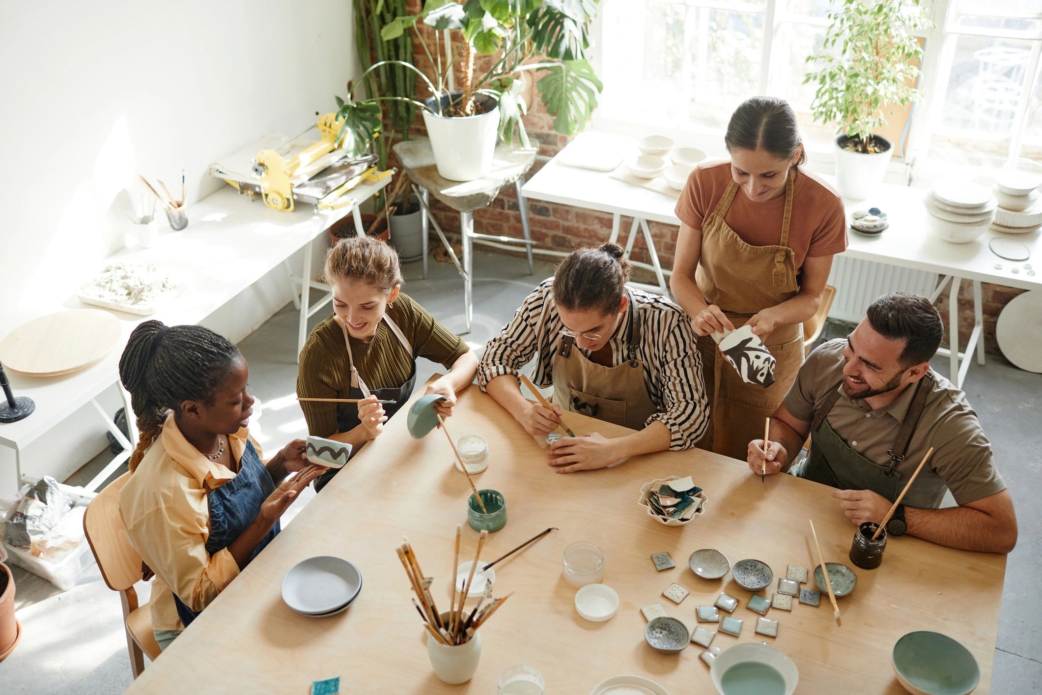 Kids working on hands-on craft projects with supplies